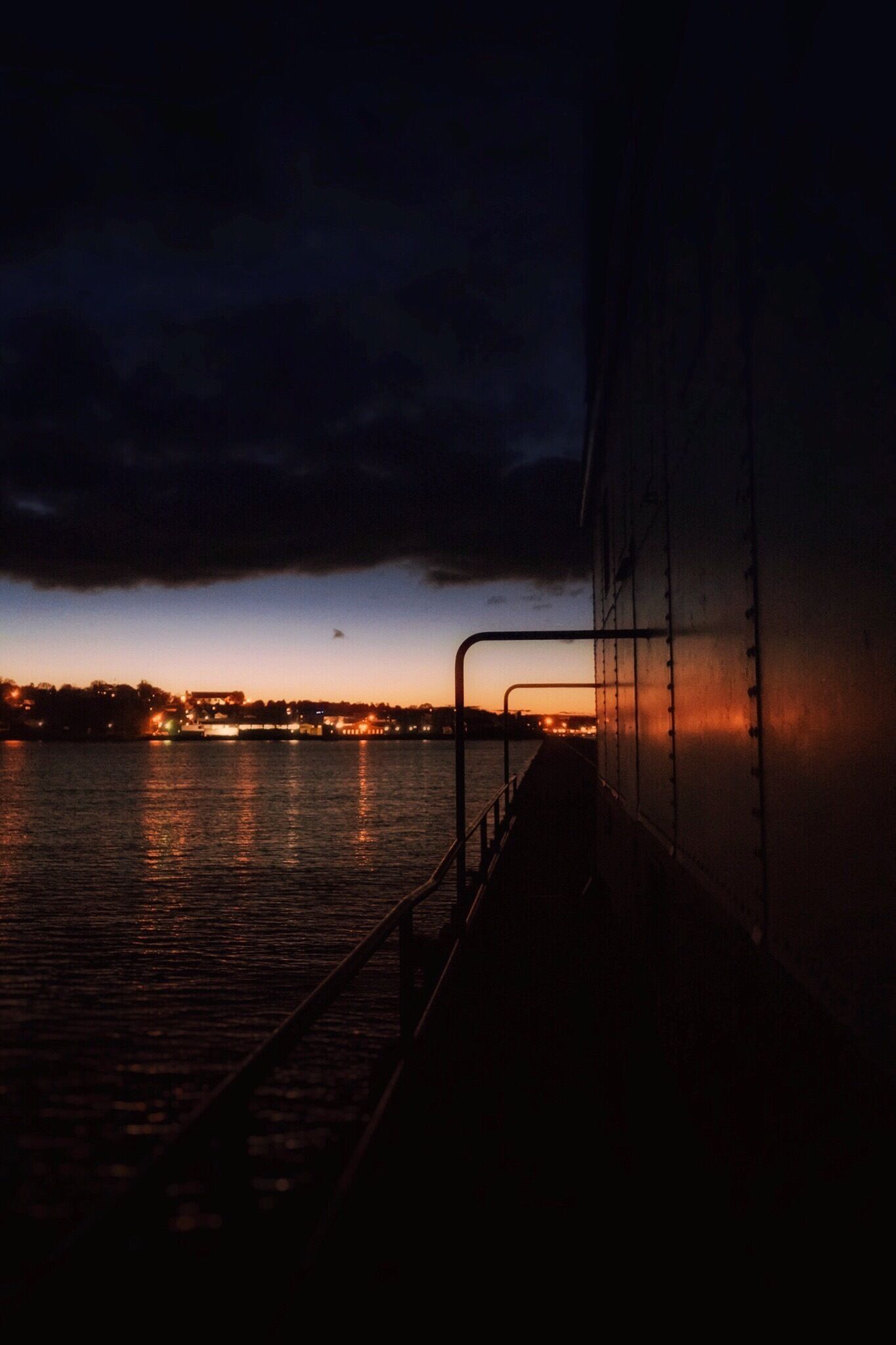 You can walk around the lighthouse at the end of the pier. When walking around and seeing Kewanee on the other side I really liked the last bit of light reflecting off of the lighthouse. 



The Kewaunee Lighthouse represents the maritime heritage of the harbor while continuing to serve as a navigational beacon to Lake Michigan boating traffic.  The property's period of historic significance begins in 1931 when it was established as a lighthouse and ends in 1959, the most recent year of its operation 50 years before the present. 


The lighthouse personifies early twentieth century lighthouse architecture and engineering.  It exemplifies design and construction methods used in building lighthouses and fog signal buildings on piers during that time period. This structure possesses its original location, setting and design, and embodies historical qualities of integrity in materials, workmanship, feeling and association. The lighthouse lantern room houses a historic fifth order Fresnel lens with an electric light that is currently used by the USCG as a navigational aid.  The character and appearance of Kewaunee Pierhead light are largely unchanged from when it was established as an aid to navigation. 