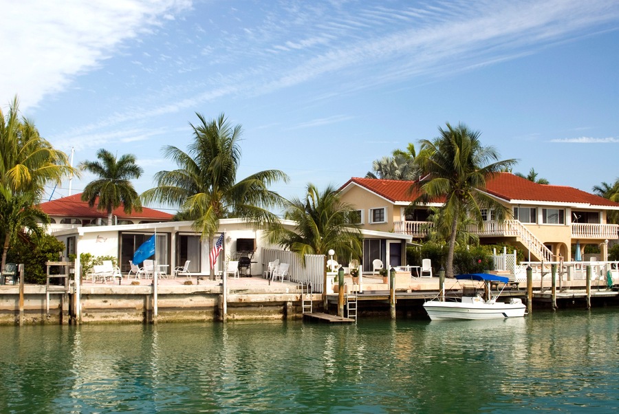 AYTN3K canal channel with boats and houses florida keys typical architecture scene