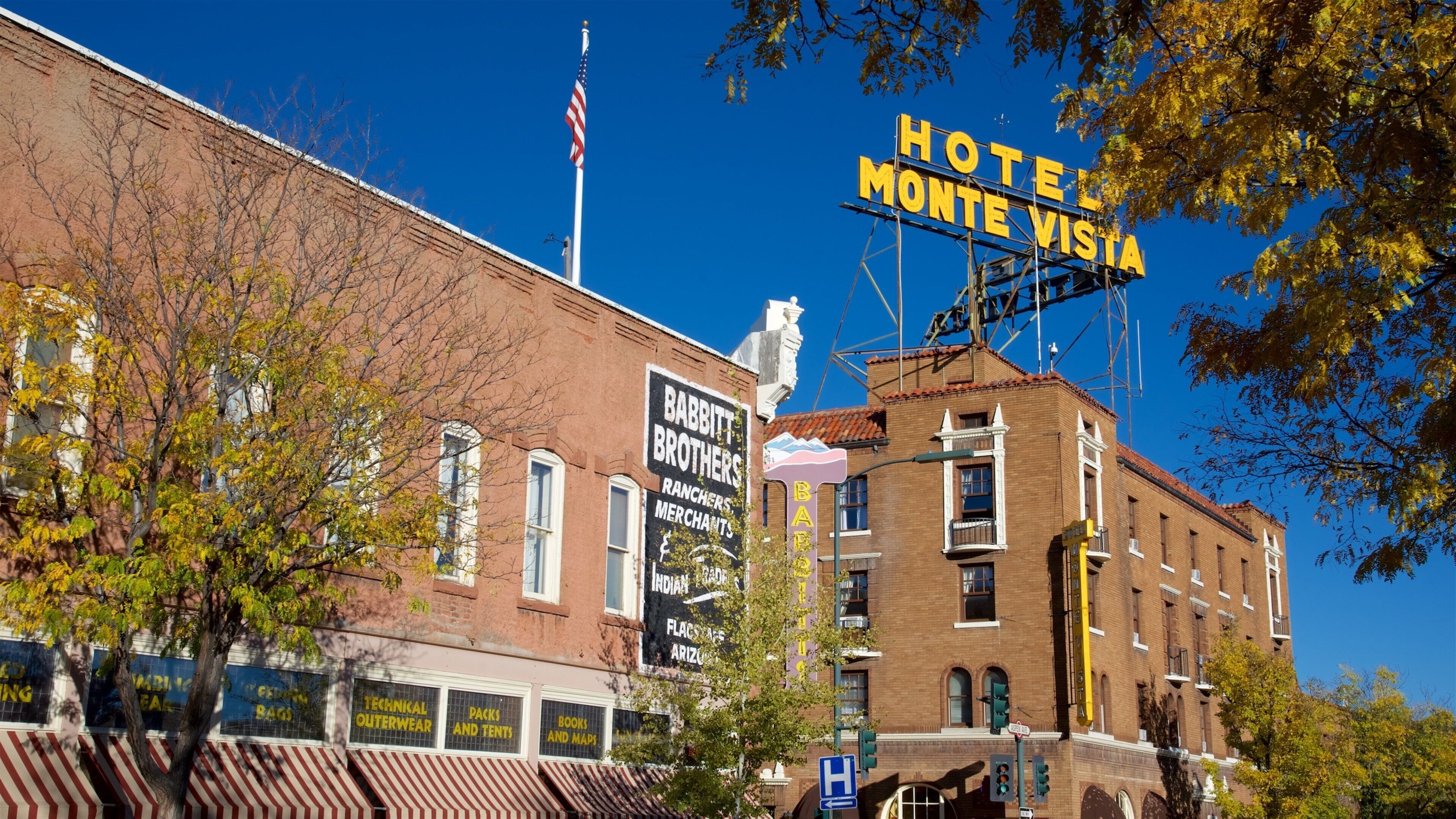 Grand Canyon showing a hotel and signage