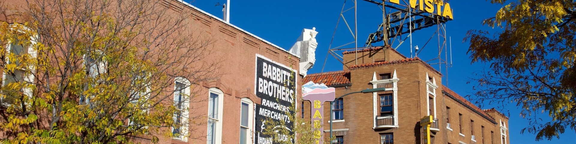 Grand Canyon showing a hotel and signage