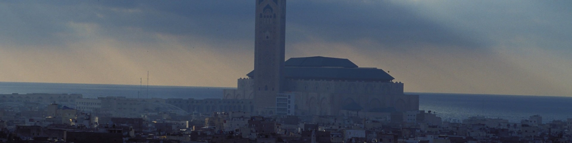 Morocco featuring a city, a sunset and a church or cathedral