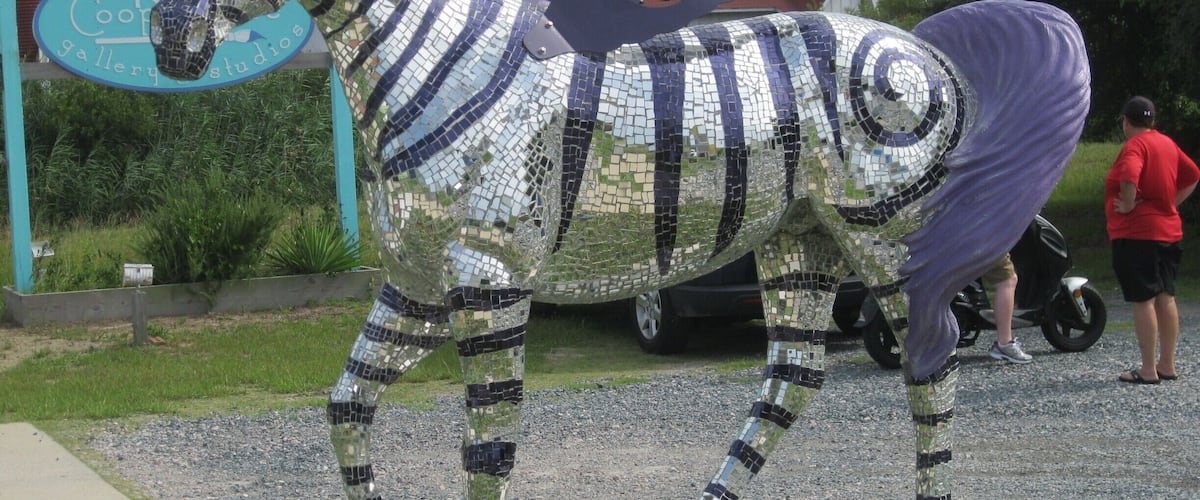 One of the beautiful sculptured 'flying horses' that one sees up and down the Nags Head to Corolla coastline. There were originally 96 of these, many that have been auctioned to help support the wild horses of Corolla.