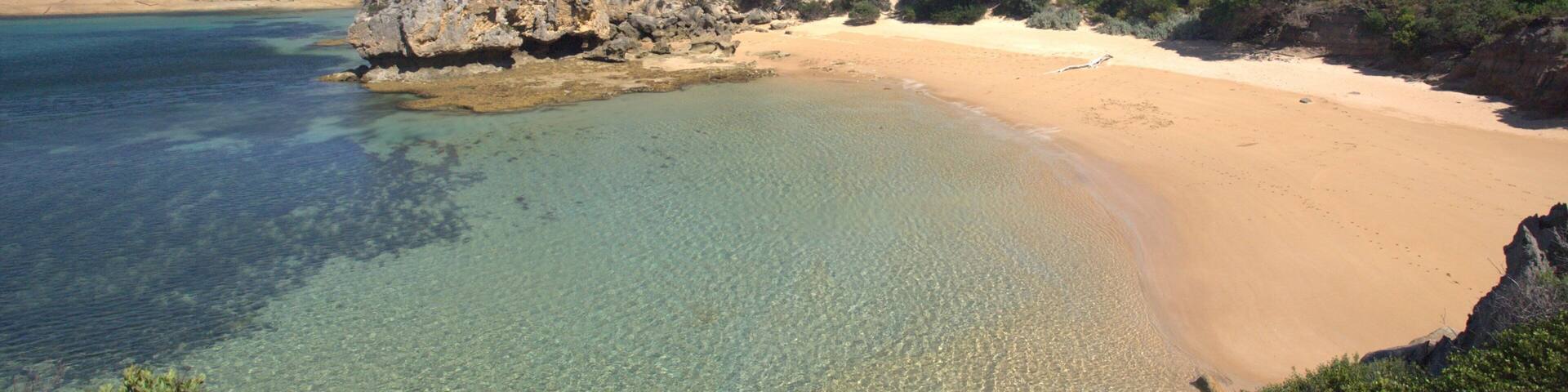 Flinders Island featuring general coastal views and a sandy beach