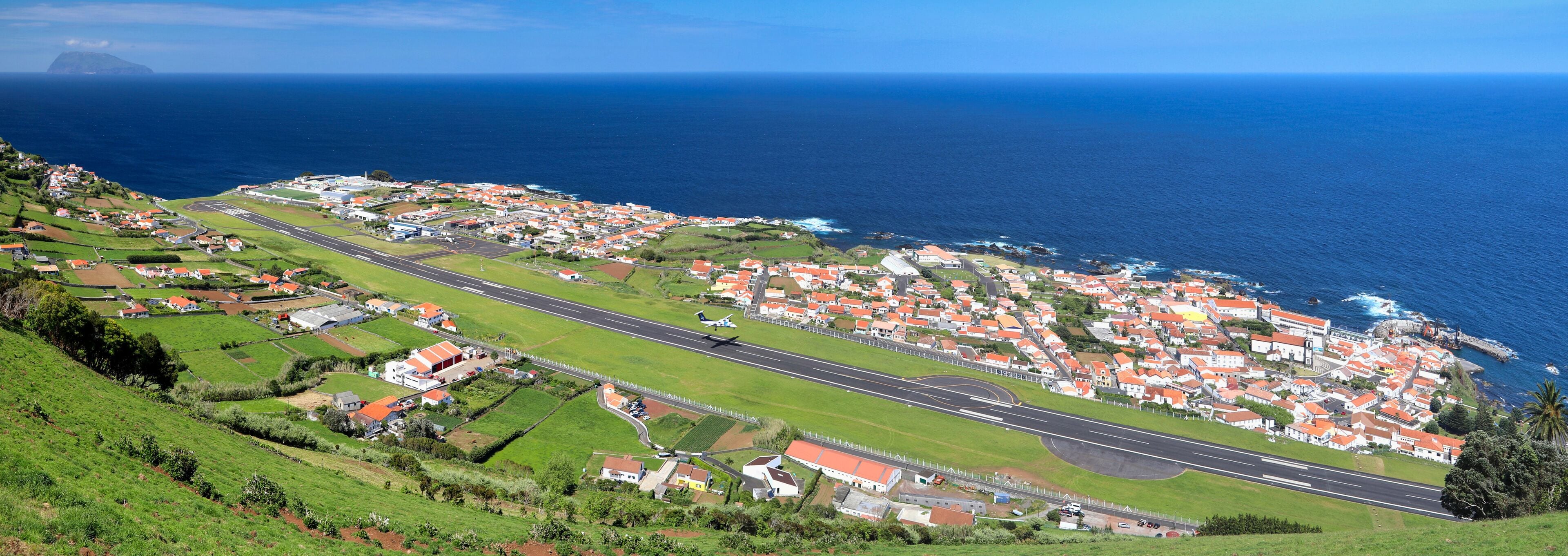 Panorama of Santa Cruz das Flores (Azores islands) with airport runway