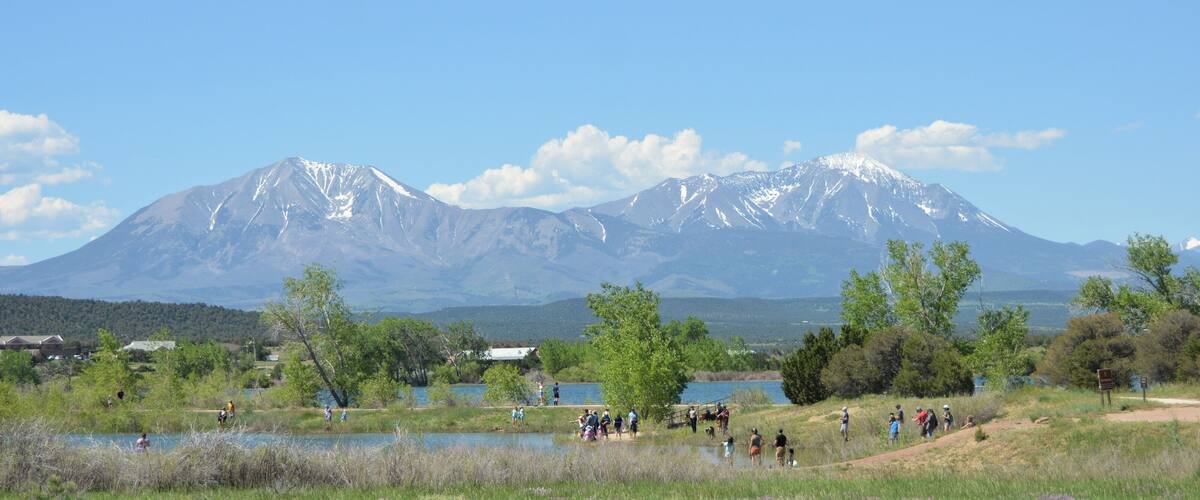 The Spanish Peaks are a pair of prominent mountains located in southwestern Huerfano County, Colorado. The Spanish Peaks were designated a National Natural Landmark in 1976.