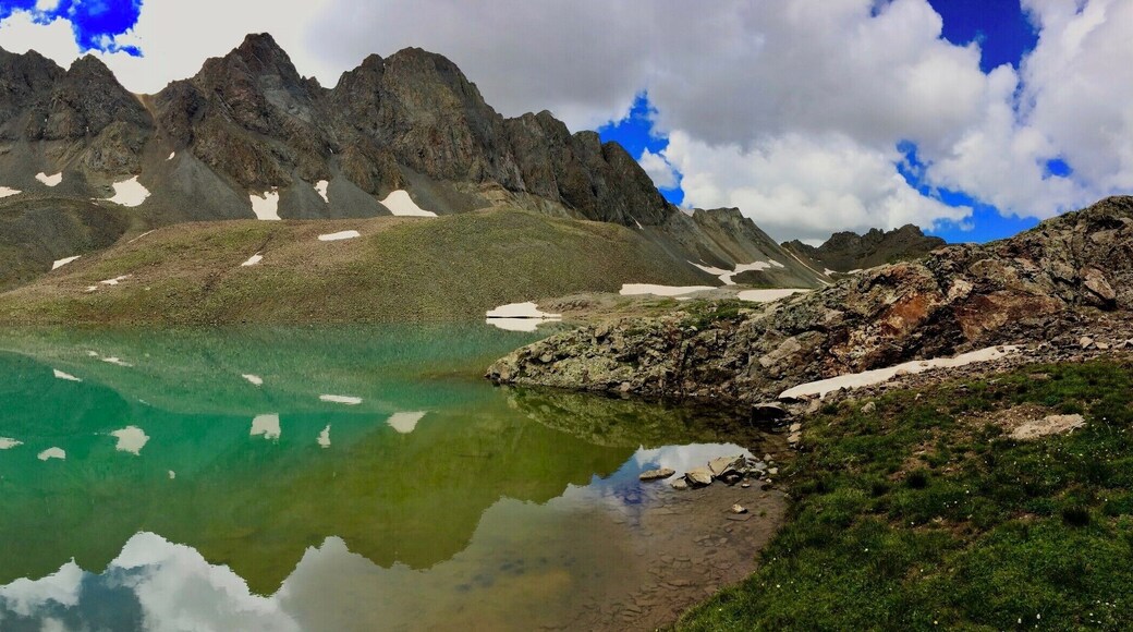 Located around 13,000ft on the way to Handies peak 14,048ft. Sloan Lake with American Peak in the background makes a well earned rest stop in both directions. For the full view please click the link below
https://www.facebook.com/grumpyhighlanderinstagram/photos/a.159217198107271.1073741830.158944511467873/166992510663073/?type=3&theater