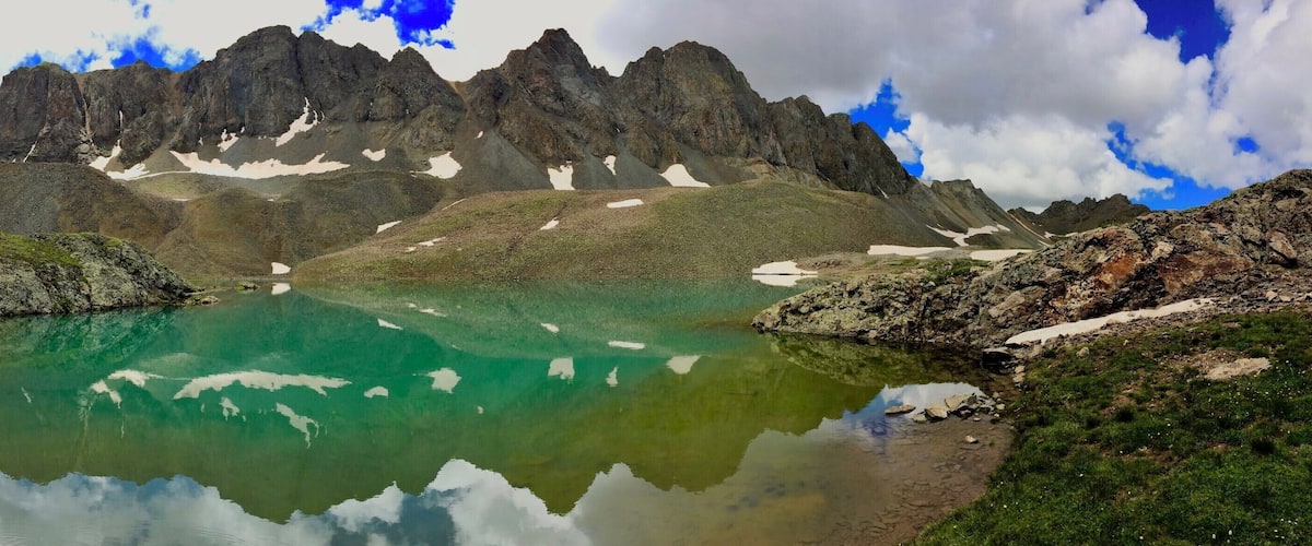 Located around 13,000ft on the way to Handies peak 14,048ft. Sloan Lake with American Peak in the background makes a well earned rest stop in both directions. For the full view please click the link below
https://www.facebook.com/grumpyhighlanderinstagram/photos/a.159217198107271.1073741830.158944511467873/166992510663073/?type=3&theater
