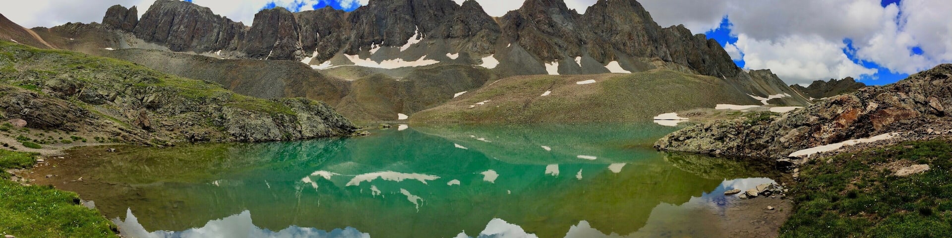 Located around 13,000ft on the way to Handies peak 14,048ft. Sloan Lake with American Peak in the background makes a well earned rest stop in both directions. For the full view please click the link below
https://www.facebook.com/grumpyhighlanderinstagram/photos/a.159217198107271.1073741830.158944511467873/166992510663073/?type=3&theater