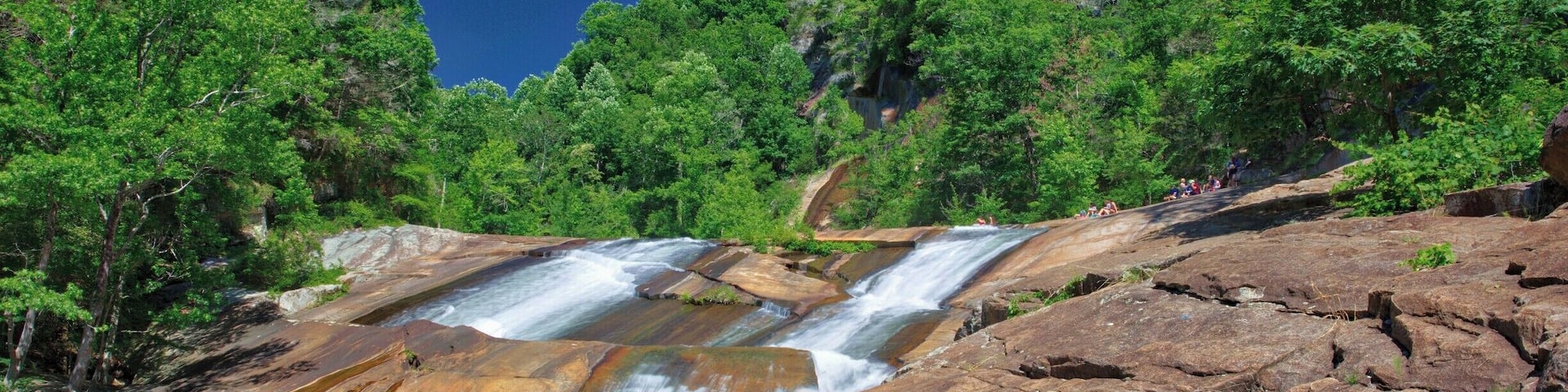 This is one of the many short falls on the Tallulah River at the bottom of Tallulah Gorge. To reach this point you have to climb 400 steps to the bottom of the gorge, cross the river (not easy) and hike about a half mile. It's a rugged hike over boulders and rock faces. Not for the faint of heart!