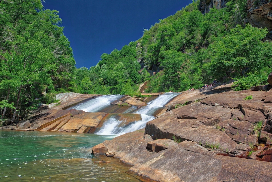 This is one of the many short falls on the Tallulah River at the bottom of Tallulah Gorge. To reach this point you have to climb 400 steps to the bottom of the gorge, cross the river (not easy) and hike about a half mile. It's a rugged hike over boulders and rock faces. Not for the faint of heart!
