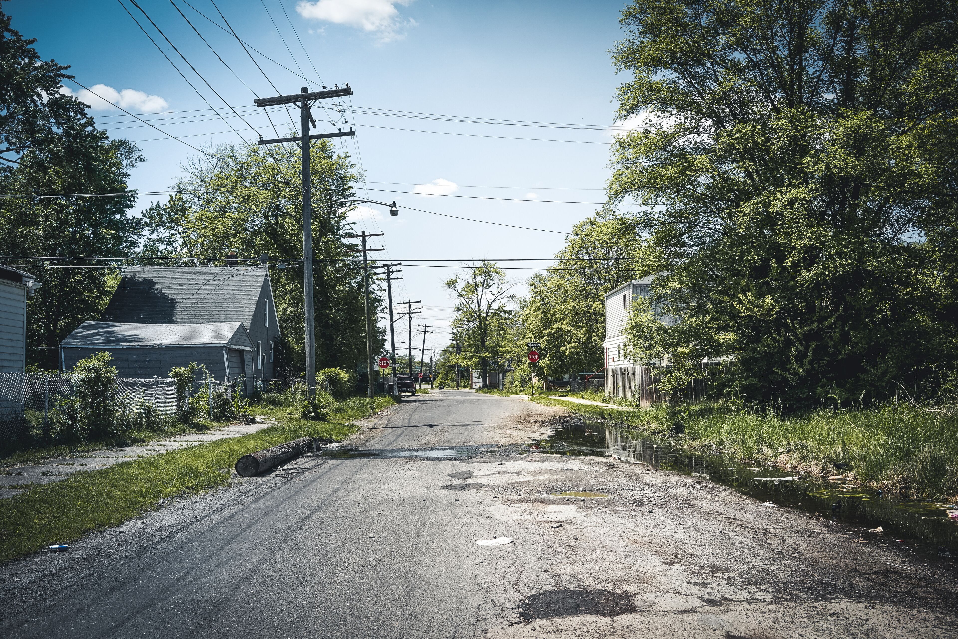 Detroit, Michigan, May, 2018: Abandoned and damaged single family home near downtown Detroit.