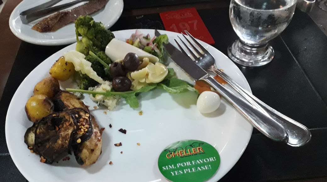 I was privileged to visit this all-you-can-eat/self-service restaurant. With the green/red card you allow the waiters to bring the delicious juicy steak at your table as much as you like. Don't hesitate to gry the chickenhearts and if you like do ask for the pork..!