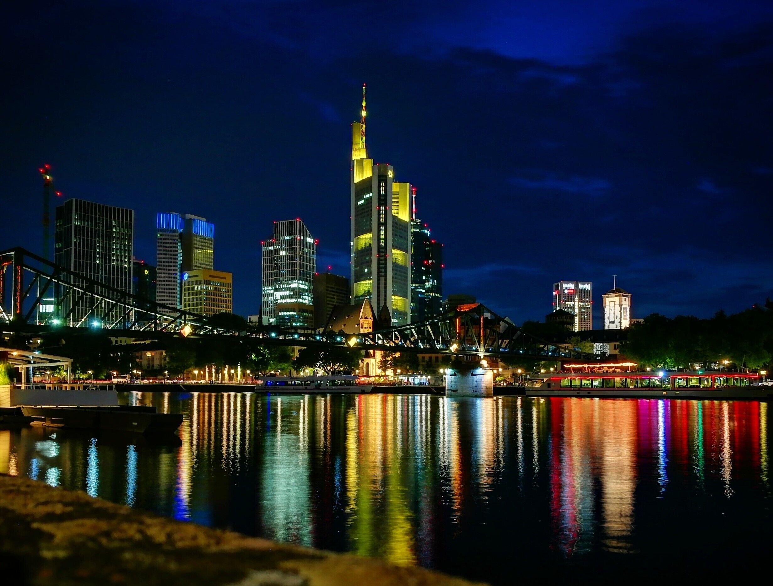 This is the beautiful skyline of Frankfurt am Main, a city located in germany. 
The bridge seen on this picture is called "Eiserner Steg" by locals.
The Photo was taken using a Huawei P9 and my backpack as a "tripod".
#smartphonephotography