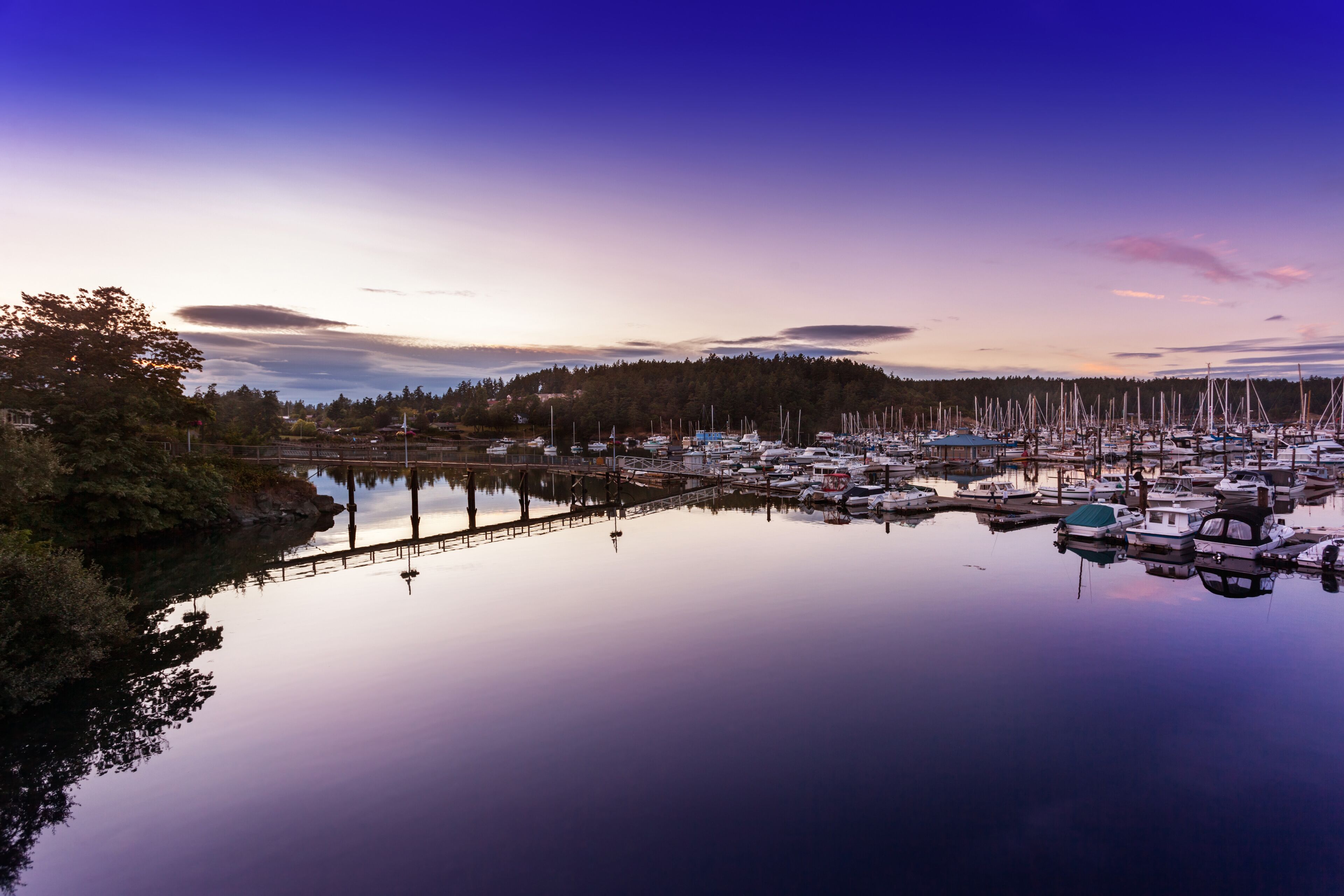 The waters in Friday Harbor's marina are still just after sunset. San Juan Islands,  Washington