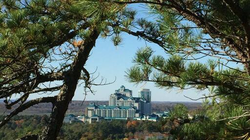 View from the Lantern Hill hiking trail with Foxwoods Resort Casino in Mashantucket, Connecticut seen through the trees