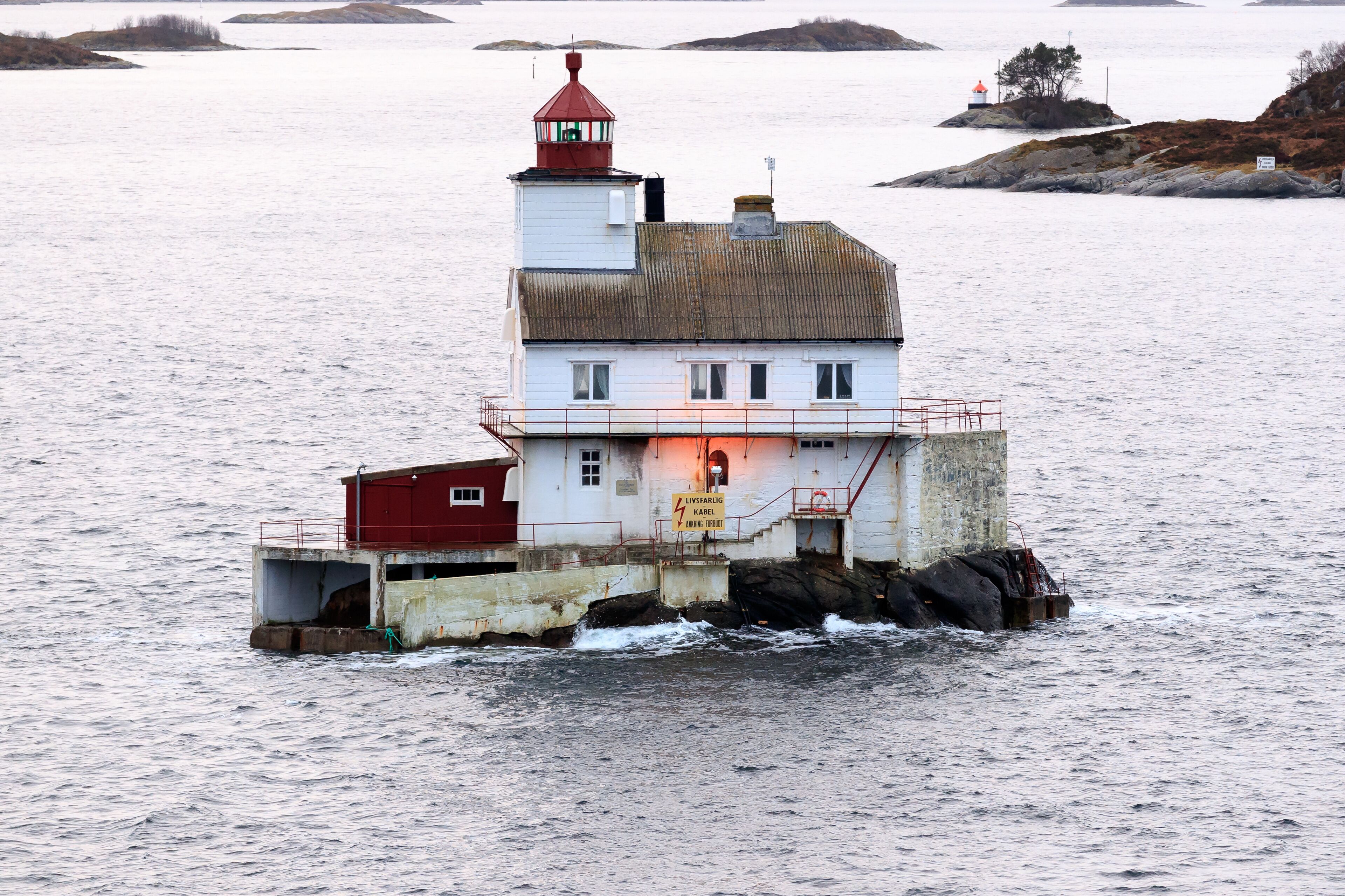STABBEN LIGHTHOUSE, NORWAY - 2016 NOVEMBER 30. Stabben Lighthouse on a rock in the ocean.