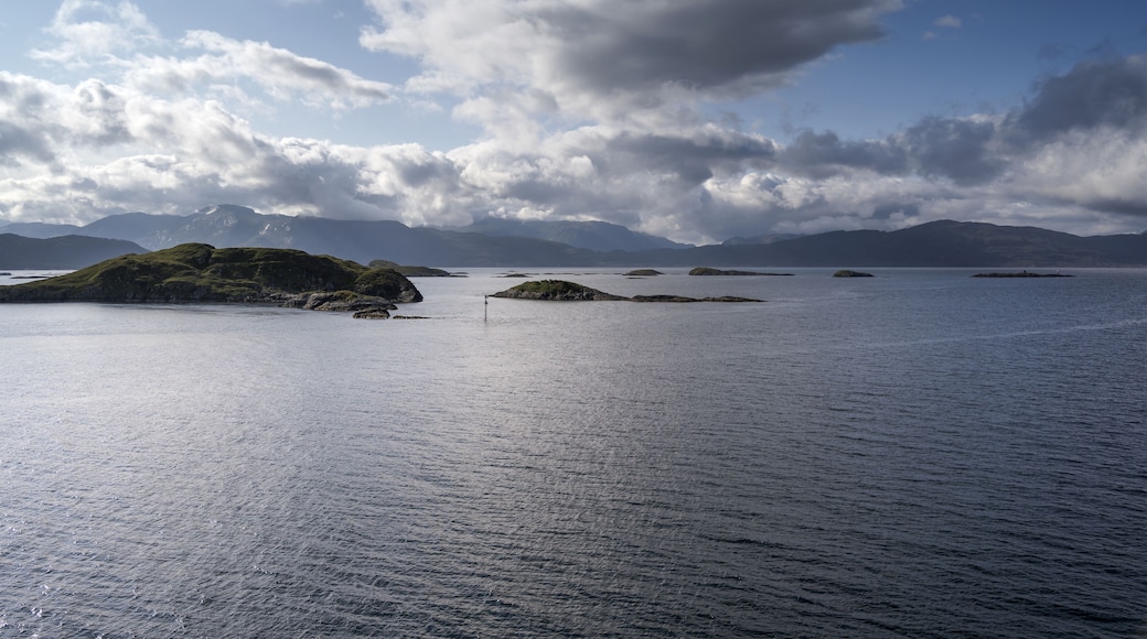 clouds on fjord cliffs, Floro, Norway