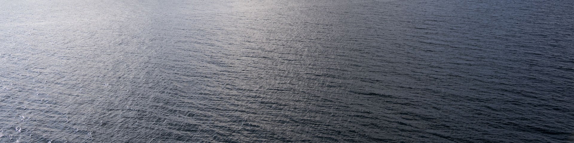 clouds on fjord cliffs, Floro, Norway