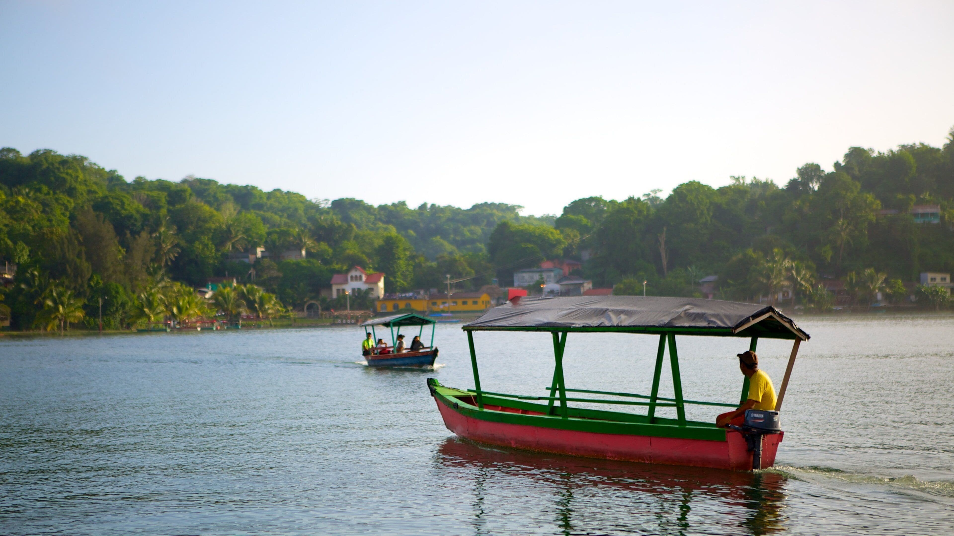 Flores which includes a lake or waterhole, boating and a coastal town