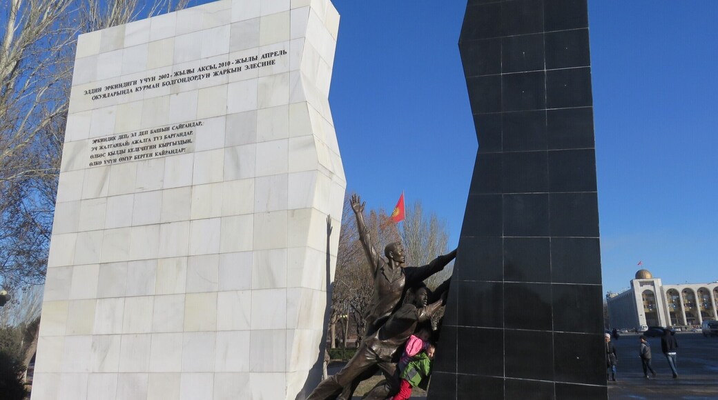 The kids were helping to push apart this monument. I had to do a little fact finding. The new monument commemorates the "April Revolution" where the black represents the Bakiyev era.