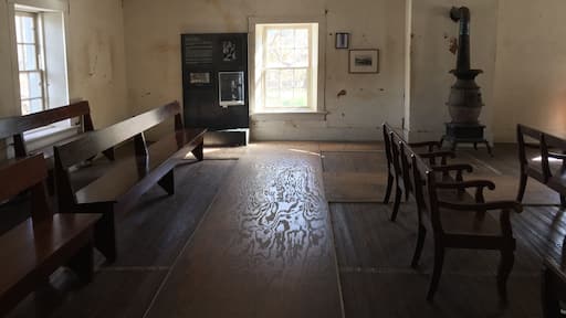The white line on the floor marks the room where Billy the Kid was chained to the floor awaiting his hanging date. He escaped and shot and killed two deputies during his escape. The room was removed during renovations to turn "The House" into a courthouse.