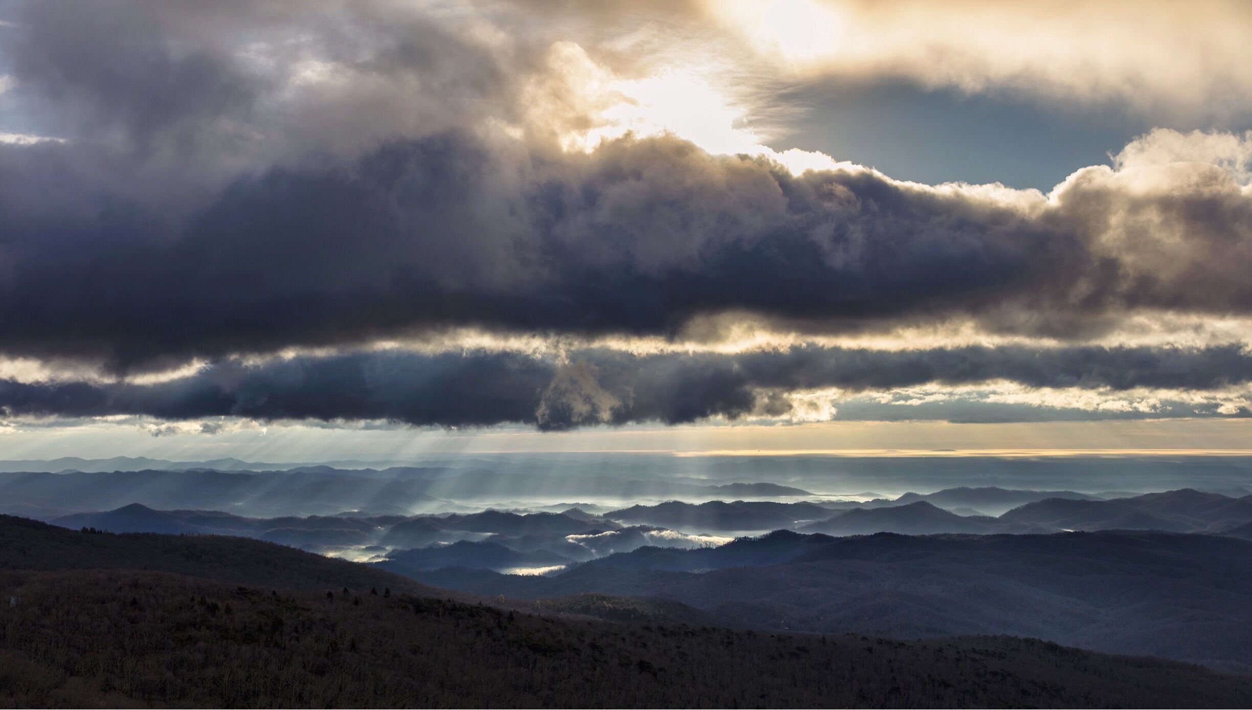 Talk about a view! The view from Linn Cove Viaduct is spectacular. You get the rolling foothills of the  Appalachians. With all the sun rays coming through it turned into a truly beautiful morning.  
