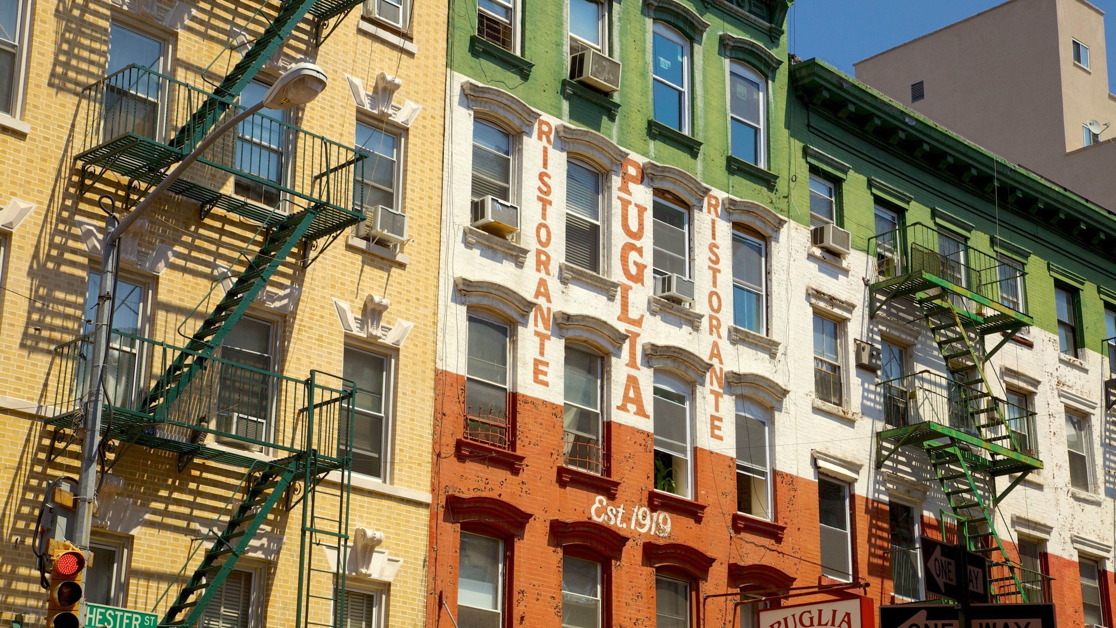 Little Italy featuring a city and signage