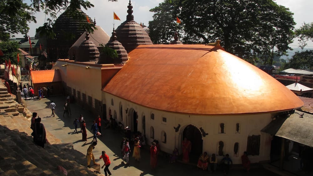 Kamakhya Temple. Dedicated to the goddess Shakti, is located in the Nilachal hill, in the western part of the city. It is a mixture of colors, smells and people... a very big show.
