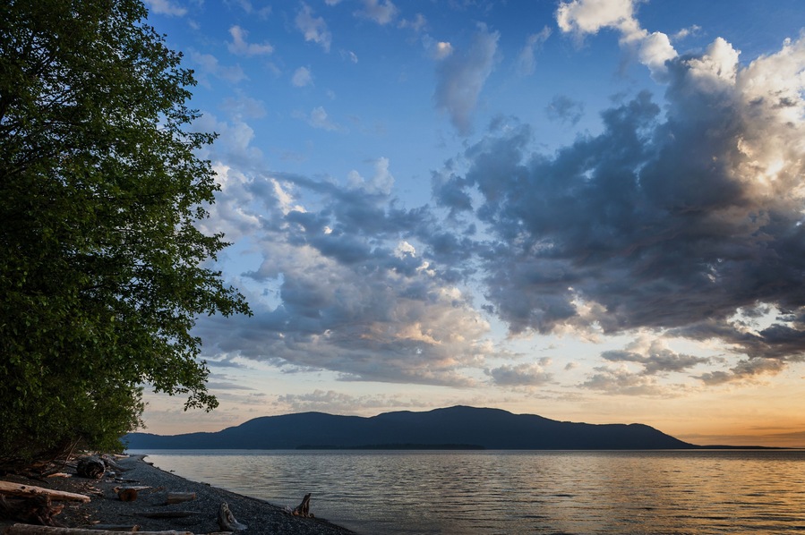 ---- Orcas Island Sunset. A beautiful sunset seen across Rosario Strait from Lummi Island  to Orcas Island in the Puget Sound area of western Washington State.; Shutterstock  ID 193474178