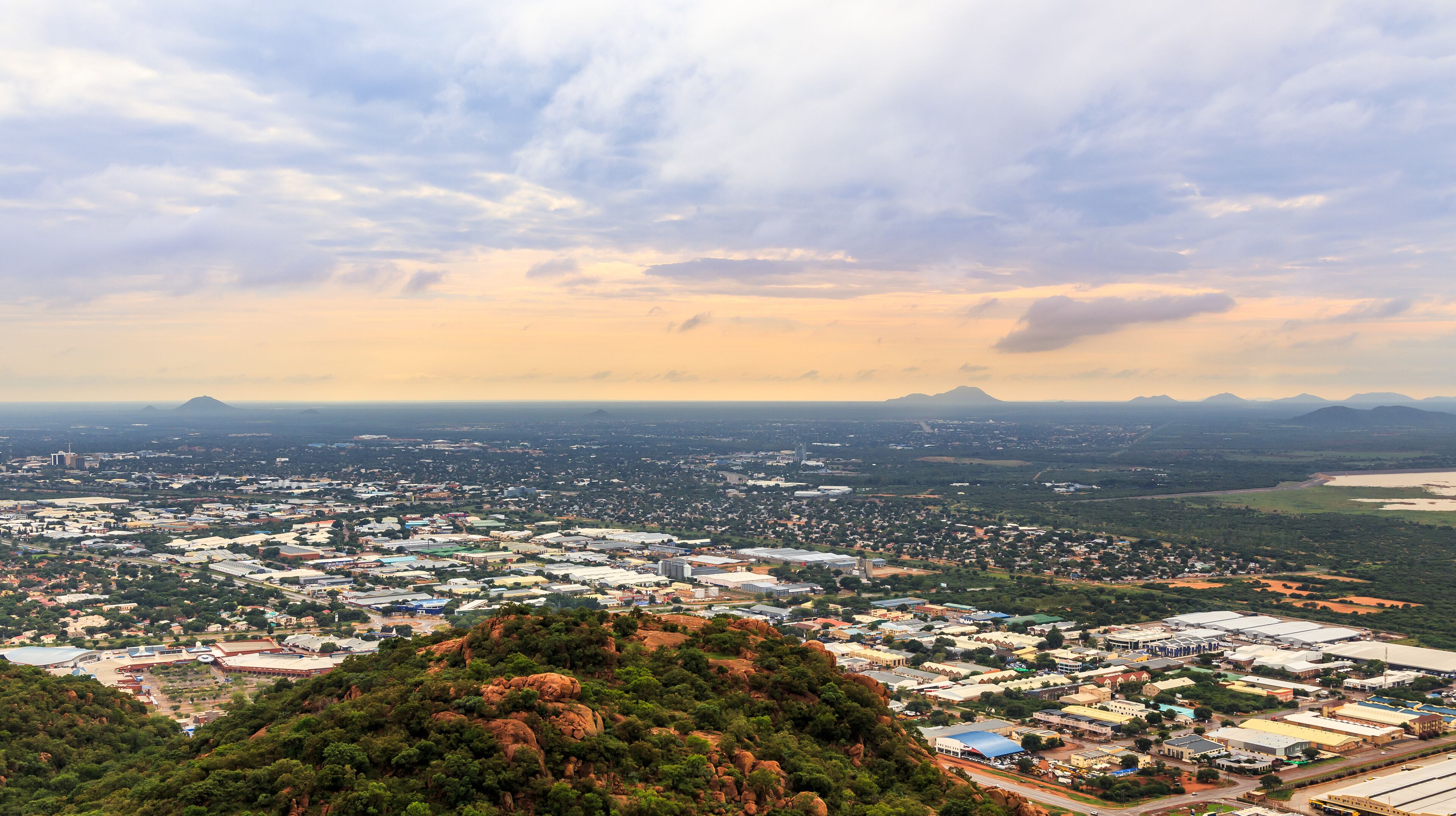 Aerial view of rapidly sprawling Gaborone city spread out over the savannah, Gaborone, Botswana, Africa, 2017