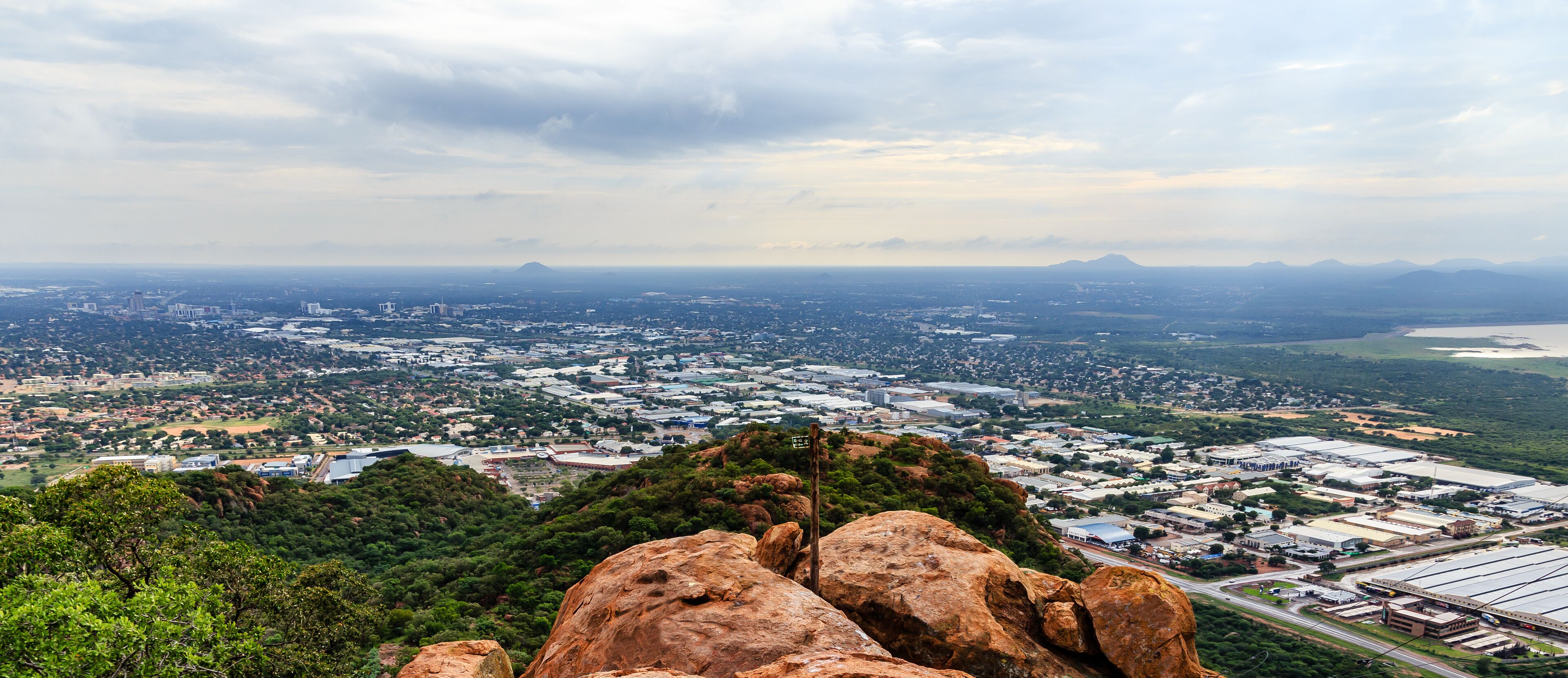 Aerial view of rapidly sprawling Gaborone city spread out over the savannah, Gaborone, Botswana, Africa