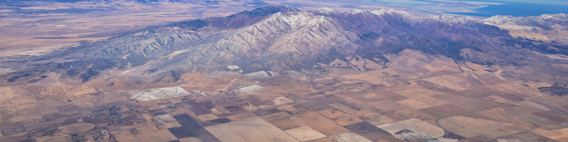 Rocky Mountains, Oquirrh range aerial views, Wasatch Front Rock from airplane. South Jordan, West Valley, Magna and Herriman, by the Great Salt Lake Utah. United States of America. USA.