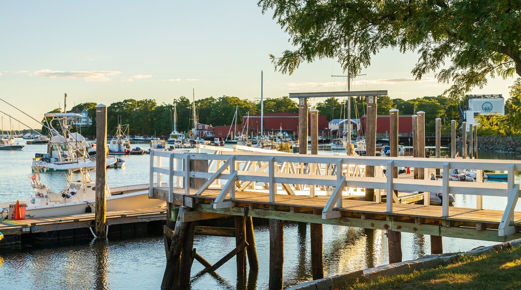 Manchester-by-the-Sea which includes a bay or harbor and a sunset