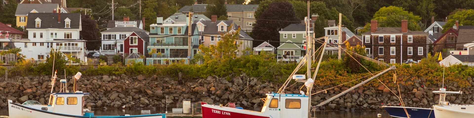 Manchester-by-the-Sea showing a sunset and a bay or harbor
