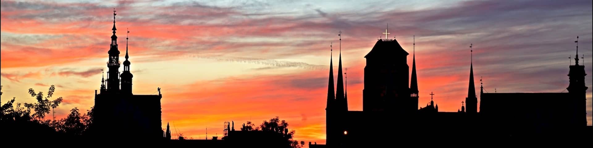 The silhouette of cathedrals during a beautiful sunset in the former free city of Danzig