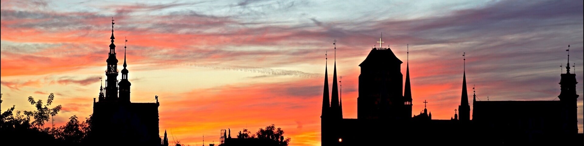 The silhouette of cathedrals during a beautiful sunset in the former free city of Danzig