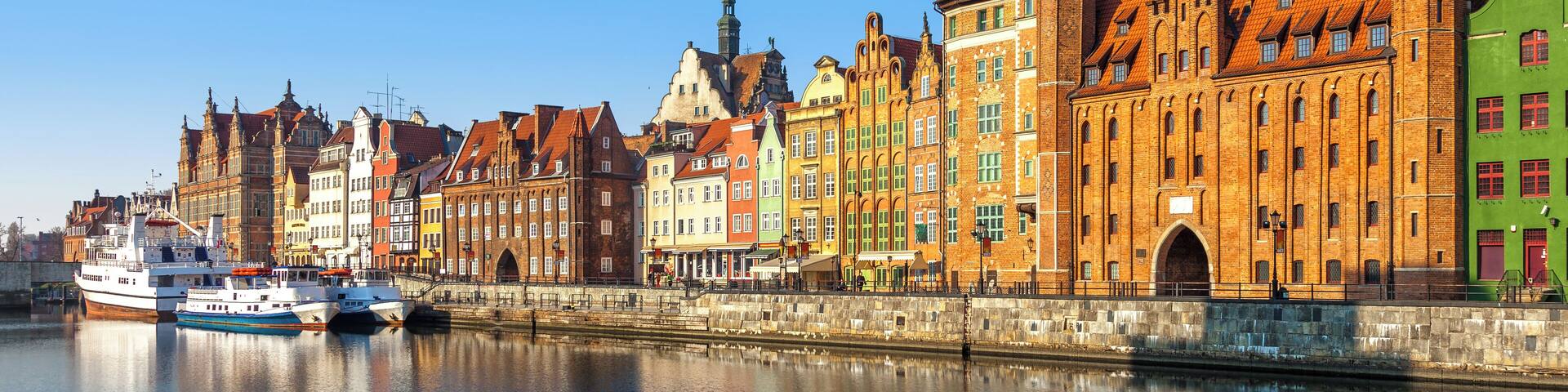 View of the riverside on Old Town by the Motlawa river in early morning light. Gdansk, Poland.