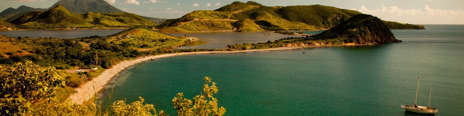 St. Kitts and Nevis showing landscape views, a sunset and general coastal views