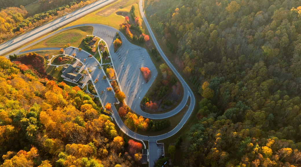Aerial view of 4 Beech Glenn Parking rest area near busy I-26 American interstate freeway with fast moving cars and trucks. Recreational place between Appalachian hills during vacation travel concept
