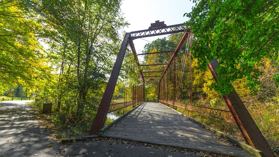 The Historic Bridge park in Battle Creek, Michigan utilizes historic bridges from the state of Michigan on its hiking trails. This includes a portion of the North Country Trail.