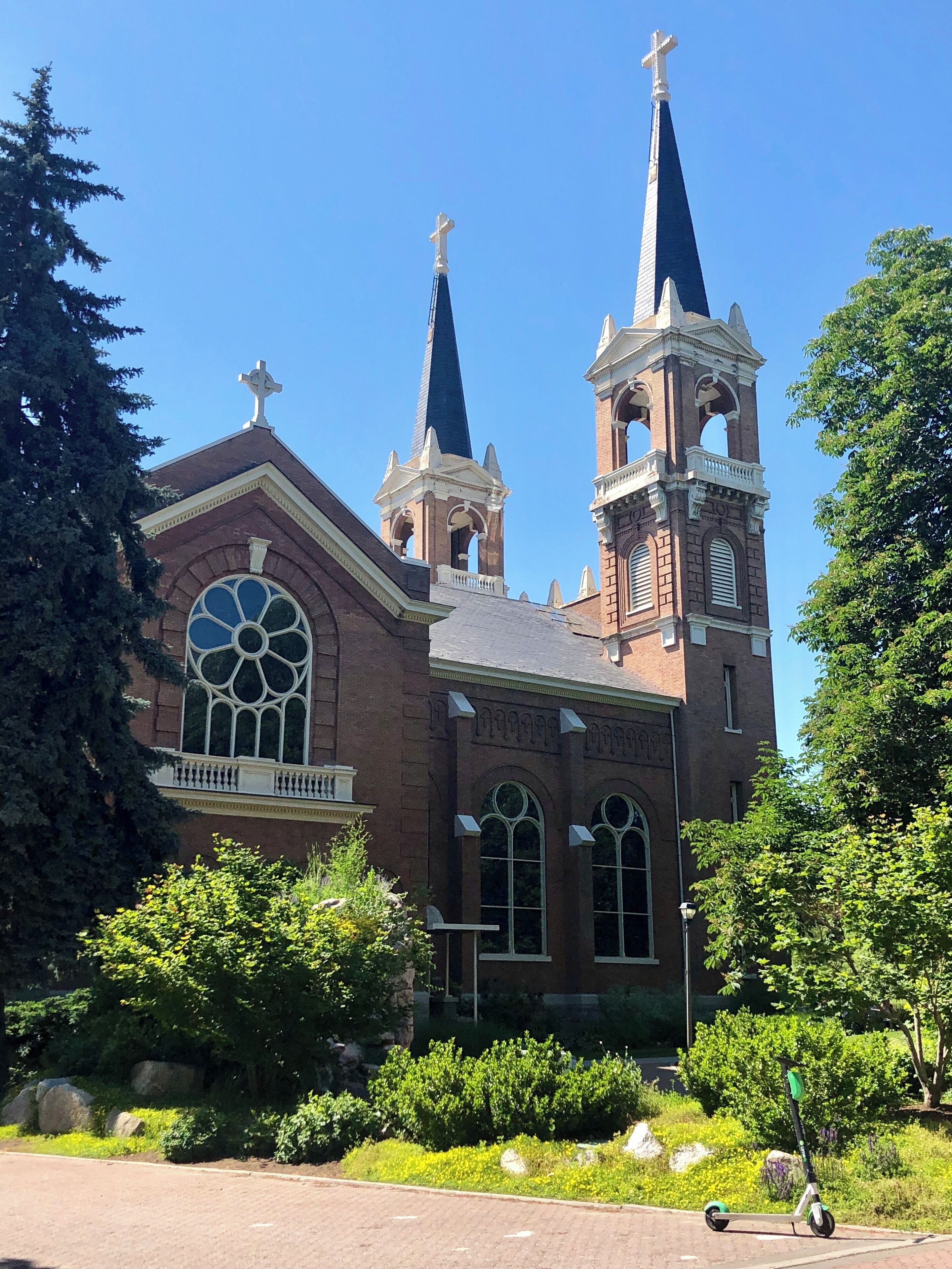 Located on the campus of Gonzaga University, the present St. Aloysius church was dedicated October 12, 1911.  It has the largest seating capacity among Catholic churches in Spokane, able to accommodate 1,100 worshipers.  The church, which replaced an original wooden structure, was designed by the architectural firm of Preusse & Zittle of Spokane.  An adapted Romanesque style, its many rounded arches and graceful circular features help to soften construction lines.  The church, begun in 1909, took almost exactly two years to build at a cost of $176,125.