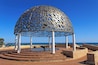 The HMAS Sydney II Memorial in Geraldton WA.
Geraldton is a coastal city in Western Australia, located 424 kilometres north of Perth.
The memorial recognises the loss of the World War II cruiser HMAS Sydney and is located on top of a small hill overlooking Geraldton.
645 people aboard the HMAS Sydney II died and so the dome is made up of 645 stainless steel seagulls.