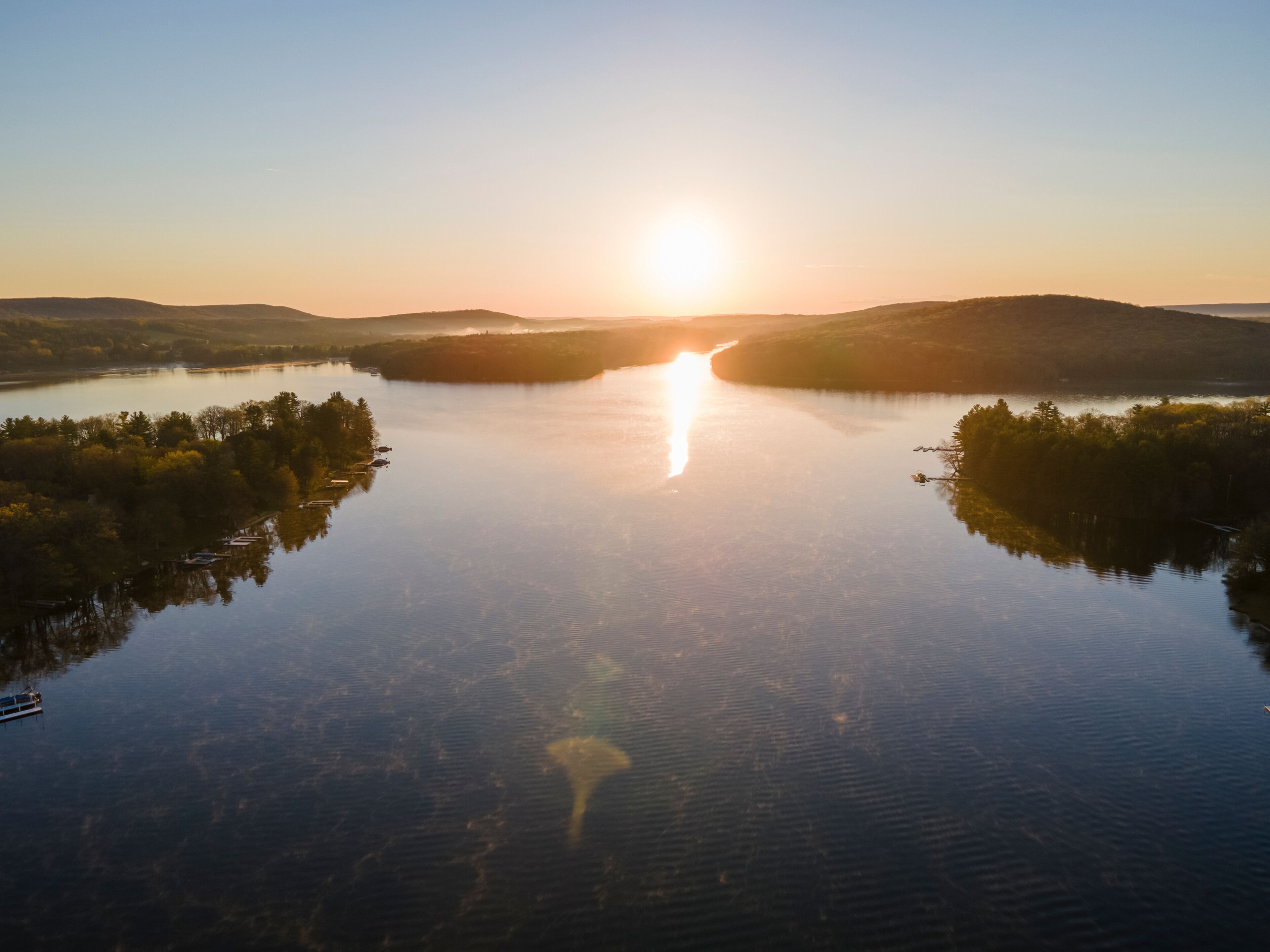 Aerial view of the sunrise over Deep Creek Lake in McHenry Maryland, United States.