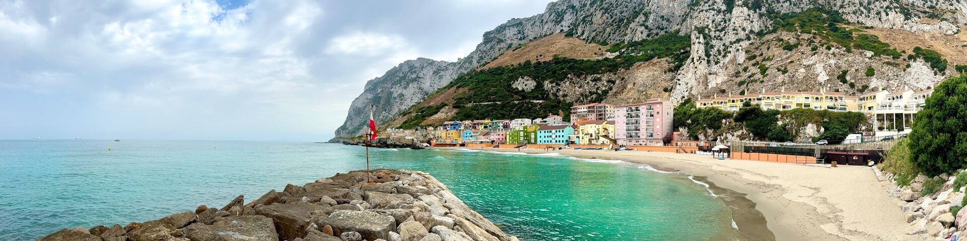 Catalan Bay: panorama view of the bay and fishing village with beach in Gibraltar, Rock of Gibraltar, Strait of Gibraltar, Mediterranean Sea, British Overseas Territory, Europe