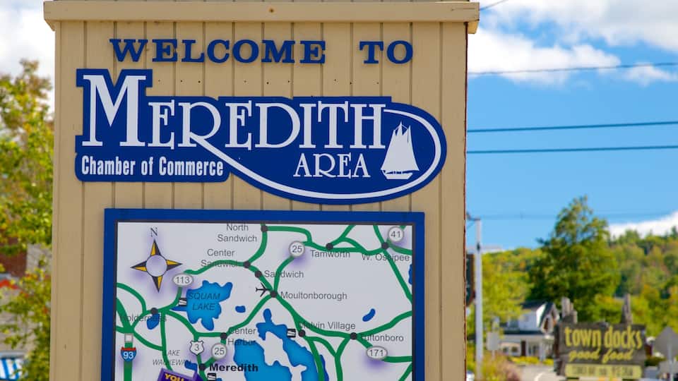A welcome sign for Meredith Area with a map below.
