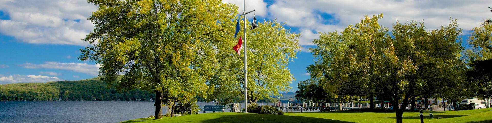 Meredith showing a lake or waterhole and a park