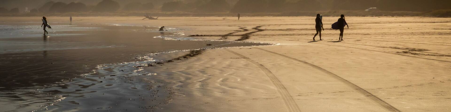 Hazy summer evening at the beach, Makorori Beach, Gisborne, New Zealand
