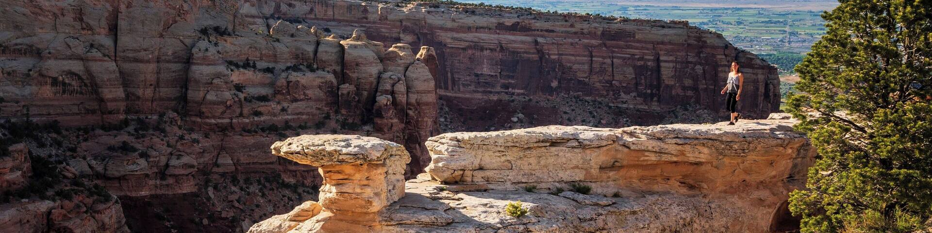 We got here at sunset and this girl was far braver than I would have been. The drop was enormous. Colorado National Monument is somwhere I can't recommend highly enough, but allow enough time for all the overlooks, it is larger than it looks. We did 3 hours that evening and another 3 hours the next morning and only scratched the surface.