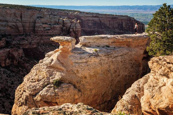 We got here at sunset and this girl was far braver than I would have been. The drop was enormous. Colorado National Monument is somwhere I can't recommend highly enough, but allow enough time for all the overlooks, it is larger than it looks. We did 3 hours that evening and another 3 hours the next morning and only scratched the surface.