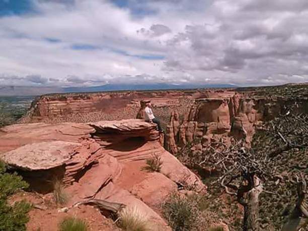Sitting on the edge! #coloradomonument #goseeit 